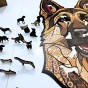 Complete set of wooden puzzles German Shepherd - assembled picture, box, and special pieces.